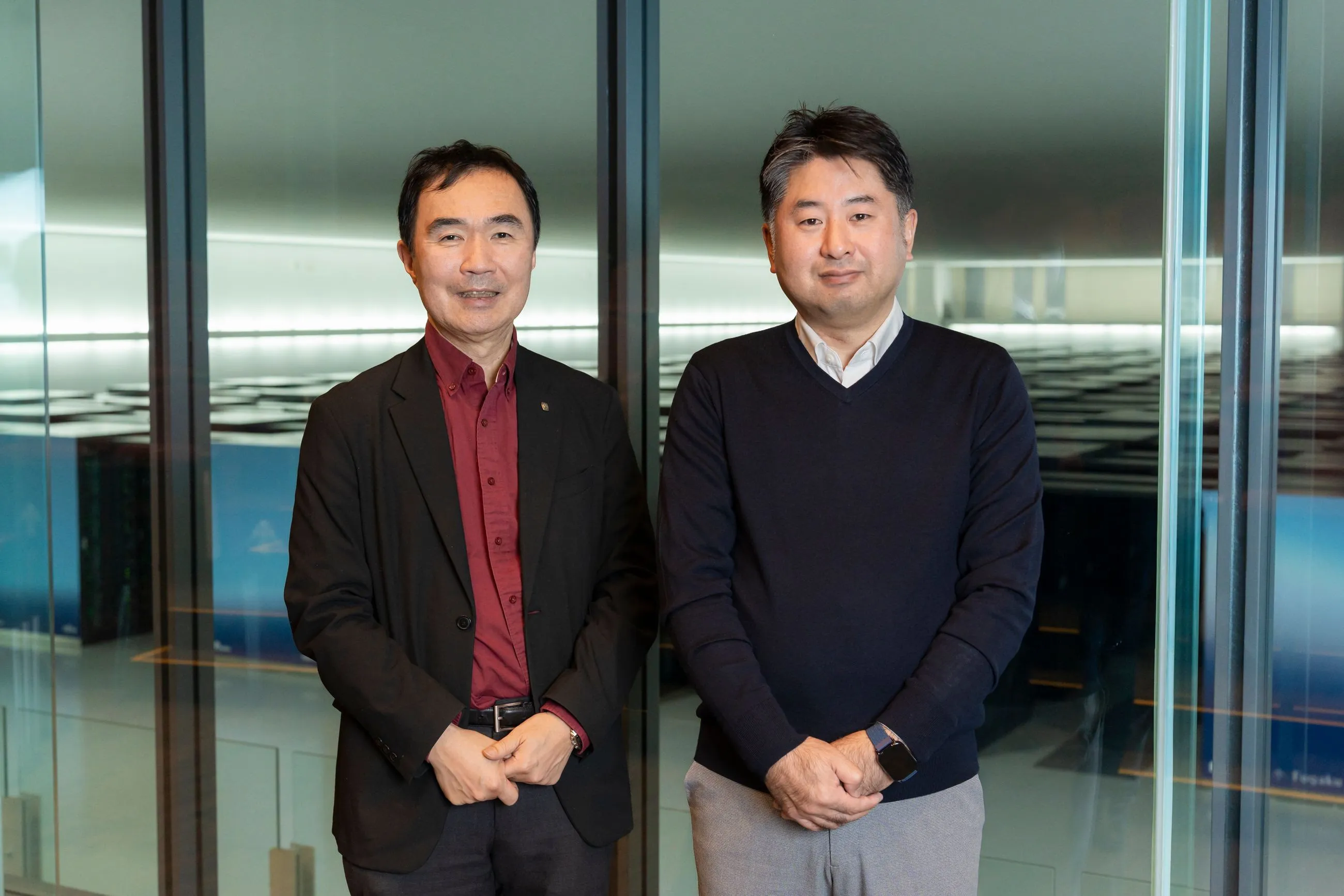 写真左から 松岡聡 R-CCSセンター長、庄司文由 運用技術部門長